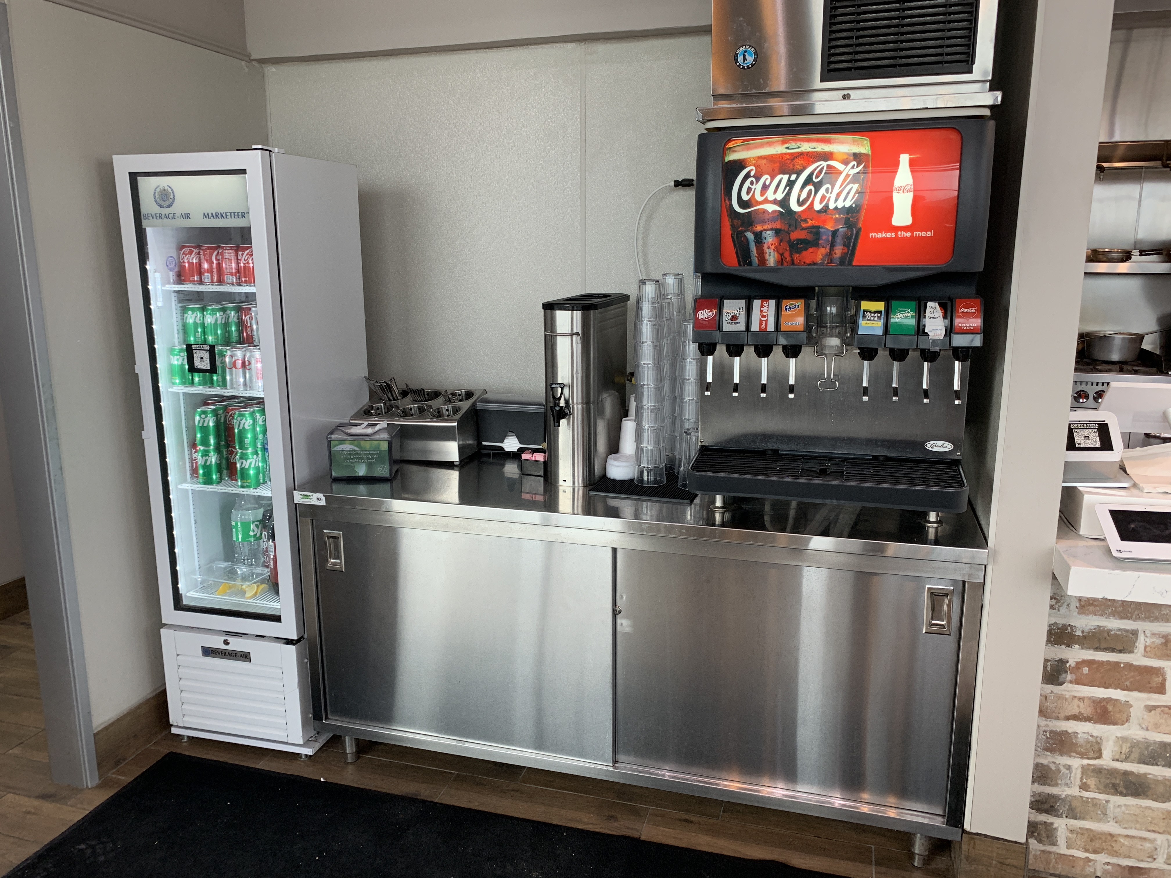 Self-serve fountain drink station with Coca-Cola beverages at Jonny's Pizza in Frisco, TX