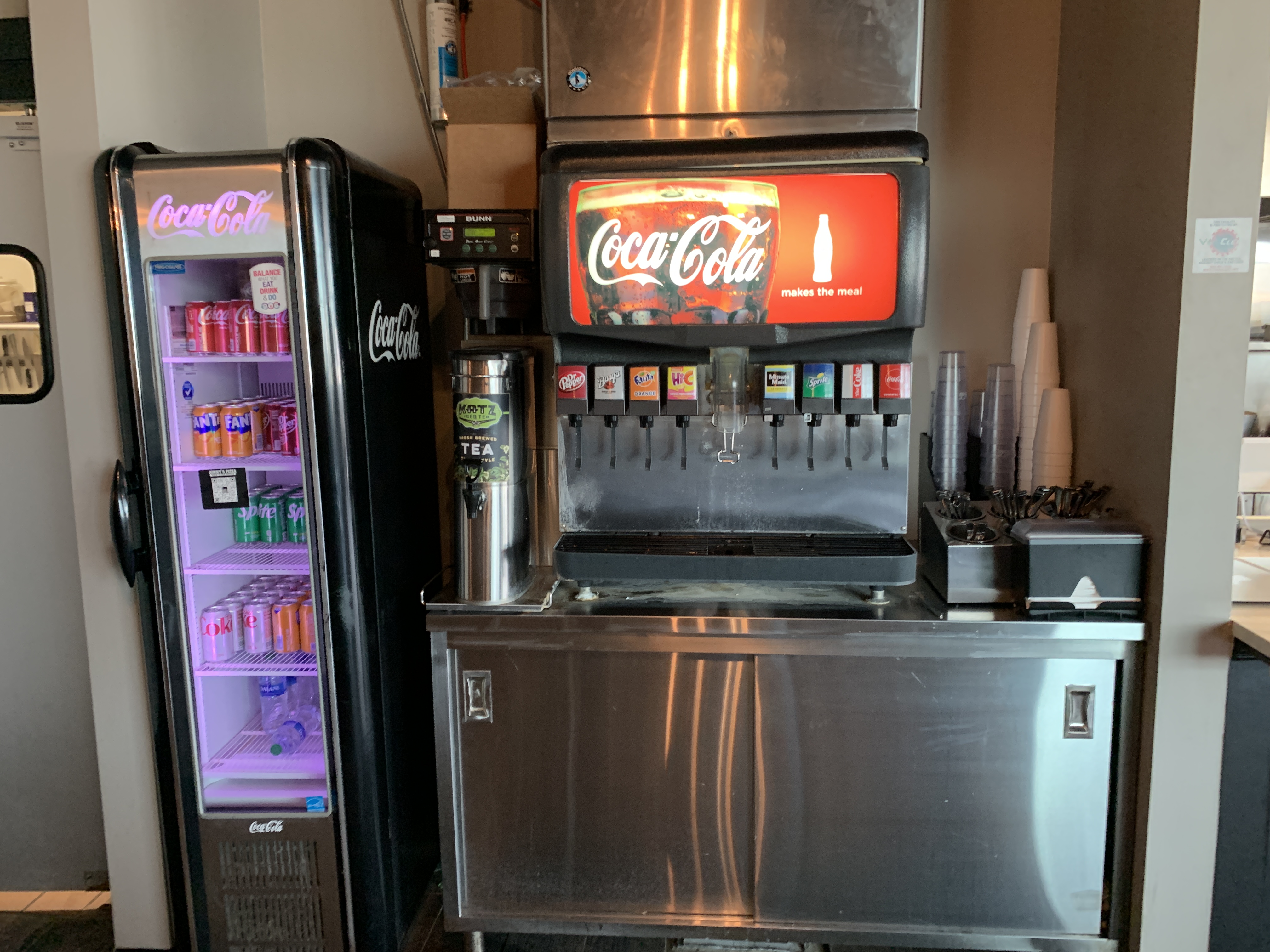 Self-serve Coca-Cola fountain drink station at Jonny's Pizza in Aubrey, TX