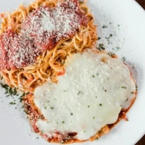 Chicken Parmesan with spaghetti at Jonny's Pizza in Aubrey and Frisco, TX