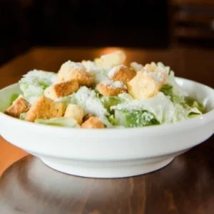 Caesar salad with croutons and Parmesan at Jonny's Pizza in Aubrey and Frisco, TX