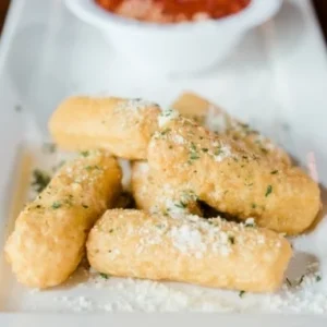 Fried mozzarella sticks with marinara at Jonny's Pizza in Aubrey and Frisco, TX