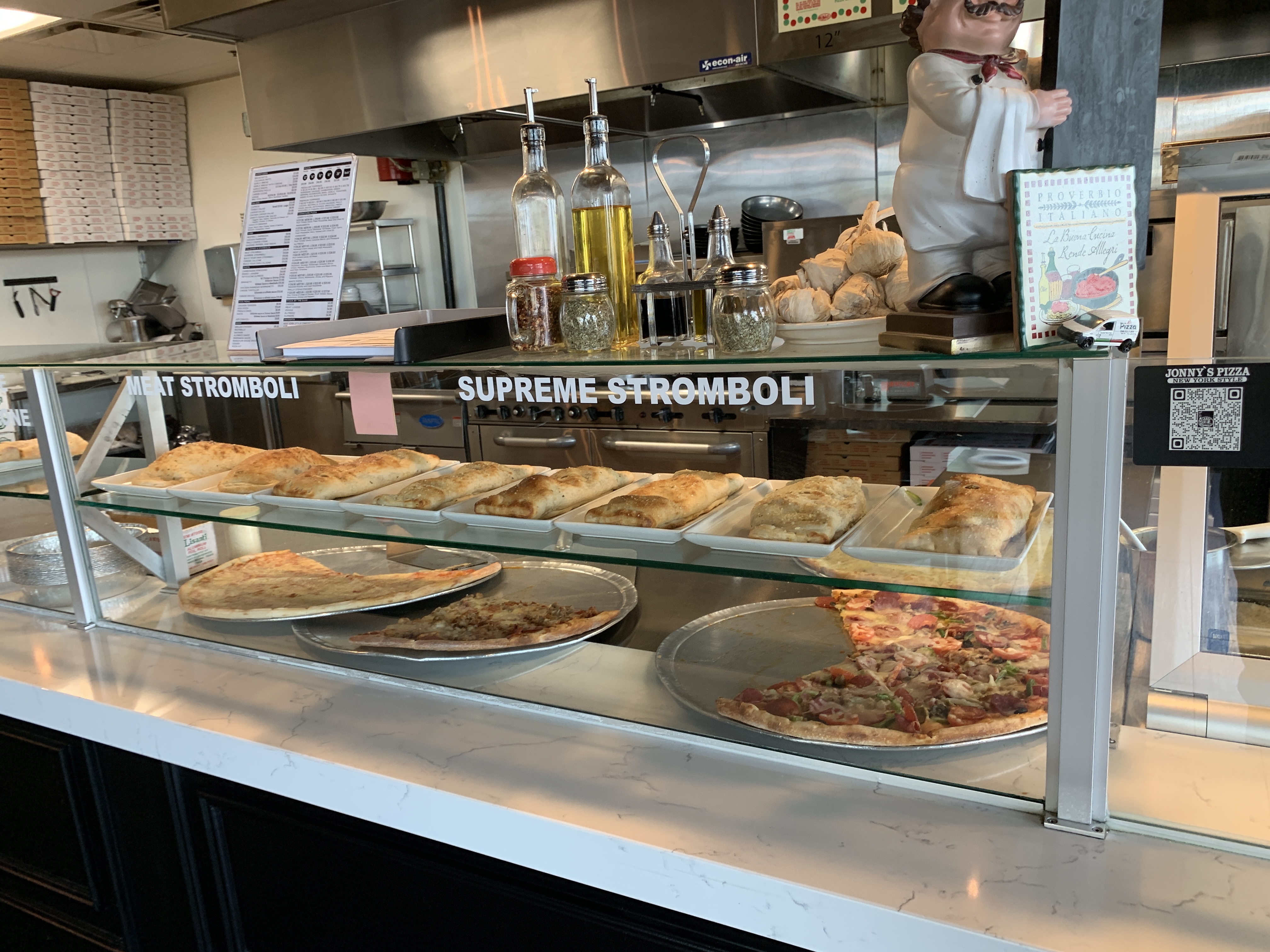 Hand-tossed pizza served at Jonny's Pizza in Aubrey, Texas
